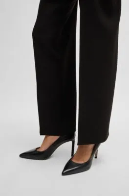 Zapatos de salón de piel con tacón alto y puntera afilada
